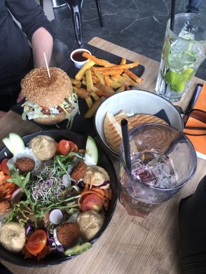 mezze bowl, burger, fries, (still warm) pita bread, housemade limo & kombucha  at El Camino in Thun