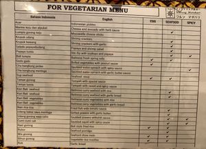 Vegetarian Menu 
clear (English) detailing of which dishes contain egg, seafood or are spicy at Warung Matahari in Hiroshima