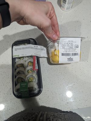 Vegan sushi and cut fruit at Whole Foods Market - 125th in New York City