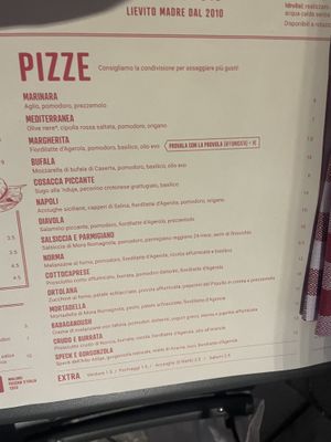 Pizza menu. The first two are “vegan”. Also a green salad for 3€ 😬 at Berberè in Florence