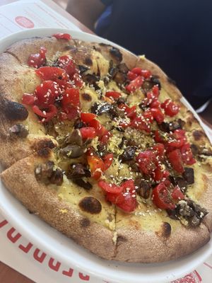 Hummus pizza was different but tasty delicious   at Berbere in Florence