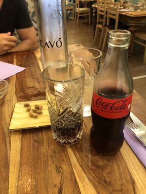 Coke and rest of olives 😁  at Cavo Bistrot in Cagliari