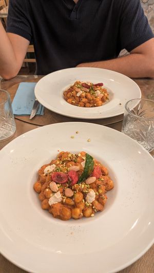 Gnocchi al pesto di pomodori secchi e mandorle, pistacchi e ricotta veg at Cavo Bistrot in Cagliari