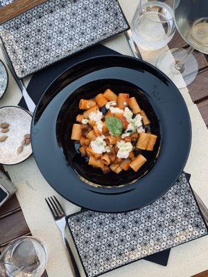 Pasta with tomato sauce, eggplant and vegan ricotta cheese 😋 at Cavo Bistrot in Cagliari
