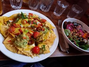 Corn chips with buddah bowl in background at Cosmic Kitchen in Plymouth