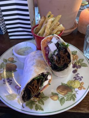 Delicious Seitan kebab, incredible garlic parsley fries, and tasty tzatsiki dip.  at Cosmic Kitchen in Plymouth