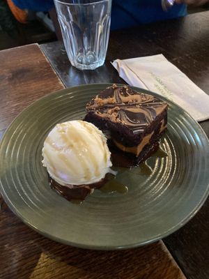 Biscoff brownie and ice cream.  at Cosmic Kitchen in Plymouth