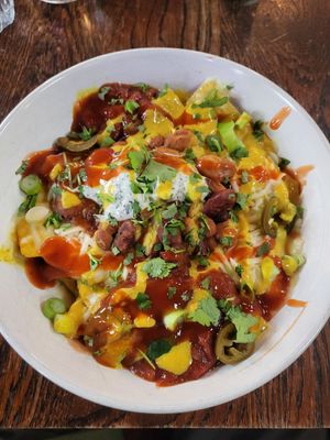 Nacho plate, no avo (I'm allergic 🤧). at Cosmic Kitchen in Plymouth