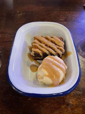 Biscoff brownie and ice cream  at Cosmic Kitchen in Plymouth