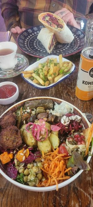Greek bowl,  garlic parsley fries and beet falafel wrap at Cosmic Kitchen in Plymouth