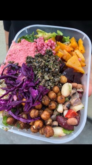Takeaway salad pots! Delicious and so healthy! I picked olive tapenade, marinated chickpeas, beetroot salad, maple roasted butternut, cous, cous, bean salad and some leafy greens!  at Cosmic Kitchen in Plymouth