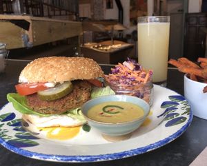 Falafel burger and sweet fries at Cosmic Kitchen in Plymouth