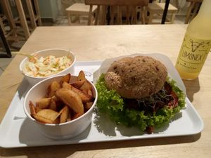 "Pastrami" sandwich with potato and coleslaw at Krowarzywa in Poznan