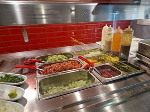 Toping at Taco Rico in Geneva