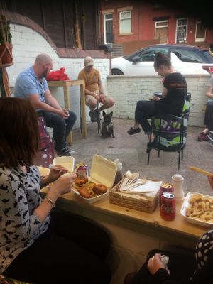People tucking into lovely vegan food, lovely atmosphere  at JJ's Vish & Chips in Leeds