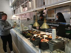 Assembly line: you order a base, veggies, and a protein (tofu) and then grab a seat. at DIG - 709 Lex in New York City