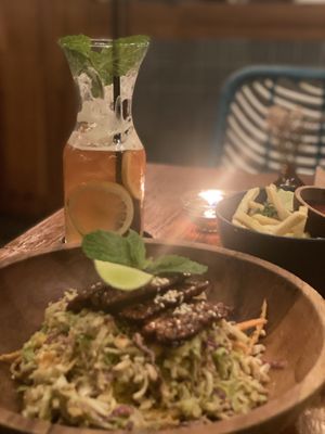 Salad with tempe and home made iced tea   at Crumb & Coaster in Kuta