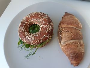 Bagel with avocado and quinoa croissant at Roots Helsinki in Helsinki