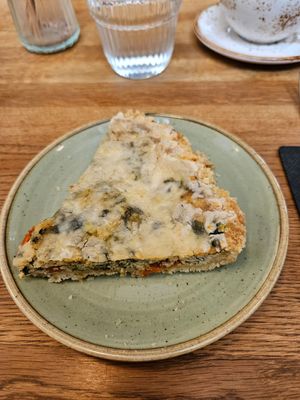 Quiche with vegan feta, tofu and vegetables at Roots Helsinki in Helsinki