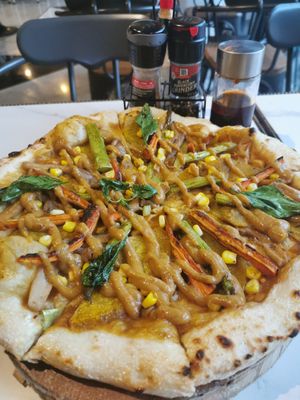 Curry pizza and katsu at Vistro in Bangkok