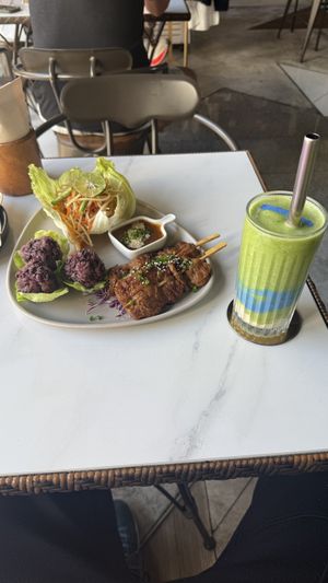 earth smoothie and papaya salad with skewers.  at Vistro in Bangkok