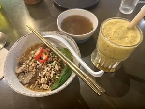 Dan dan noodles and tropical smoothiee  at Vistro in Bangkok