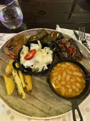 Vegan plate. Really good pickled cabbage and stuffed vine leaves   at Te Fisi in Shkoder