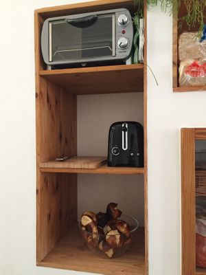 toaster and oven to bake / reheat the saved groceries  at Raupe Immersatt Cafe in Stuttgart