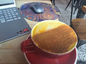 Tumeric latte - how did they know I like a lot of cinnamon 🤔 at Parlé Pantry in West London