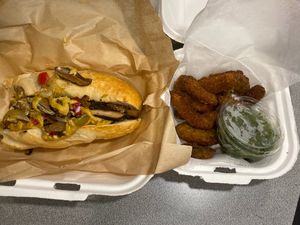 Cheesesteak and avo fries at Tween the Tides in Provincetown