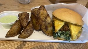 Vegan brekkie sandwich and potato wedges  at New General in Winter Park