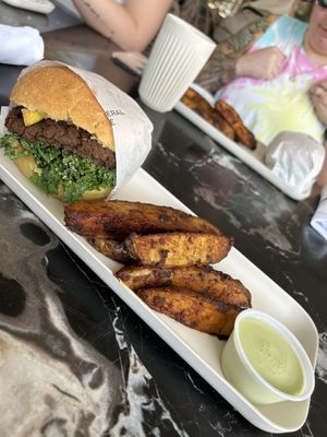 Vegan brekkie Sandwich with potatoes  at New General in Winter Park