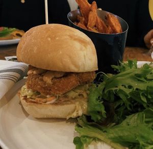 Tofu chikn burger & sweet potato fries at Plant City in Providence