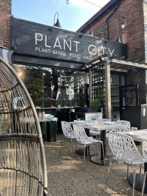 Chilling outside in these cool wicker comfy chairs listening to house music vibes. Great place to catchup with friends and enjoy some of the best vegan food in town .  at Plant City in Providence