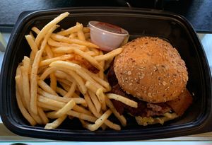 Crave (Impossible) Burger with vegan bacon and side of fries

 at CRAVE in Sioux Falls