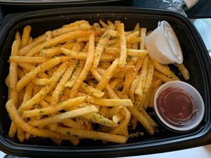 Vegan truffle parmesan fries with ketchup at CRAVE in Sioux Falls
