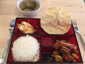 Sweet and sour pork ribs with cucumber, tomatoes and pineapple rice set. at Food in The Woods 小树林 in Northeast Singapore