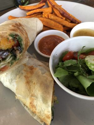 Grilled Greek Wrap with sweet potato fries and side salad at Farm To Table in Phnom Penh