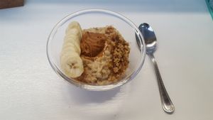 Delivious Porridge made with Oatmilk and served with a variety of toppings, heres shown with Biscoff, Banana, Pumpkin Spice and Briwn Sugar.served all day long. at Kawaffle in Plymouth