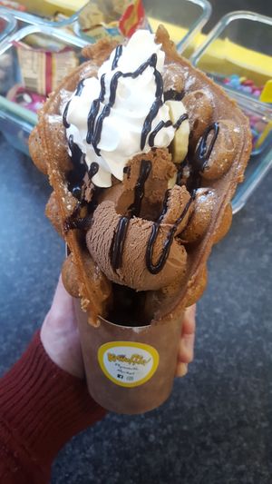 Entirely Vegan Gluten free bubble waffle..... chocolate sauce, banana, chocolate ice cream and cream! at Kawaffle in Plymouth
