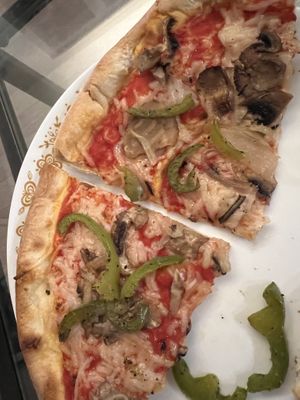 Vegan personal pizza with mushrooms, caramelized onions, and pepperss  at Union St. Pizza in Brooklyn