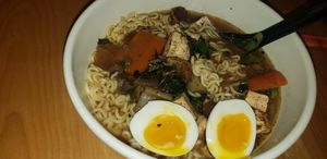 Everybody loves Ramen
Noodles, marinated grilled tofu, roasted bok choy and carrots, shiitake mushrooms, cabbage, onion, garlic, and a medium boiled egg in a sesame ginger mushroo at Labyrinth Press Company in Jamestown