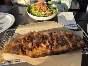 Vegan flatbread and side salad   at Labyrinth Press Company in Jamestown