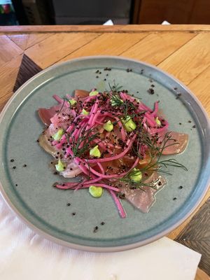 Cured target beetroot w/ red cabbage juice pickled kohlrabi, puffed quinoa, zucchini mayo and caramelized orange dressing at Ballard's in Thornbury