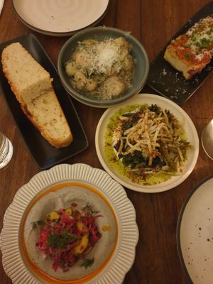 Focaccia, mushroom gnocchi, garlic bread,  charred brassicas, eggplant dip at Ballard's in Thornbury