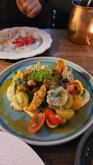 Heirloom tomato salad $16.00 - delicious esp the corn+onion crisp at Ballard's in Thornbury