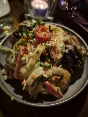 Crispy smoked+smashed potatoes w/chilli, lemon thyme vinaigrette $14: prefer less sauce so potatoes stay crispy at Ballard's in Thornbury