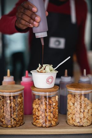 You can choose a topping of your choice from an array of delicious superfoods & sauces at Unframed Ice Cream in Cape Town