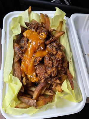 The clean pig with cheese at Galaxy Rune in Seattle