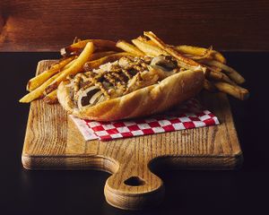 Bratwurst

Our large house crafted bratwurst is full of flavor.  It comes covered in grilled sauerkraut/onions, and topped with stone ground mustard at Galaxy Rune in Seattle